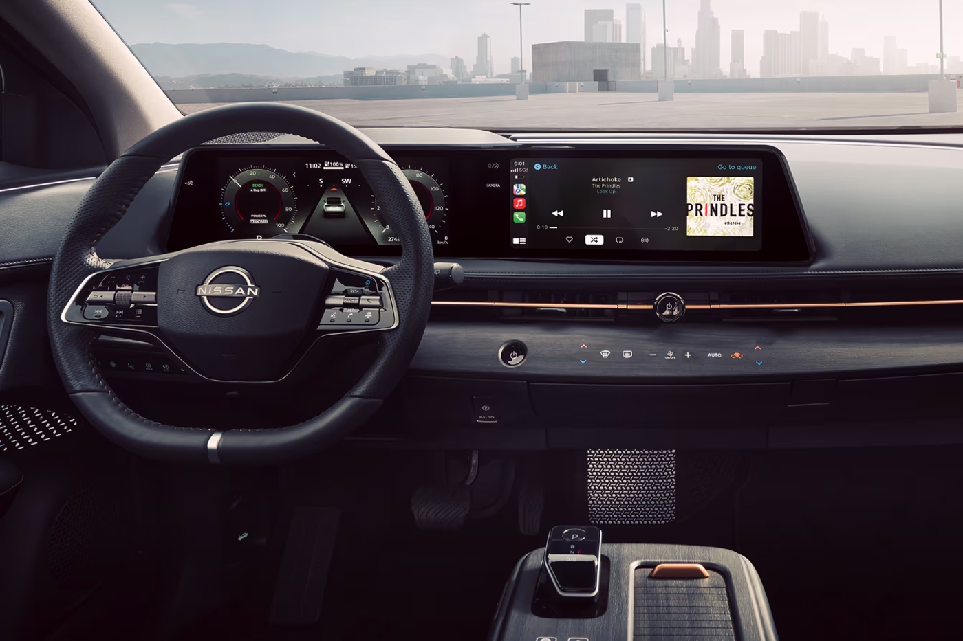 Vue de l'intérieur de la Nissan ARIYA 2026 et son tableau de bord